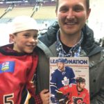 Kaidin's first game Calgary of course!
He is with a camp alumni Mike Verelli. 