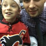 Kaidin (now a MacDougall Hockey Camp participant) hanging with Mark (camp alumni) after his first game!
